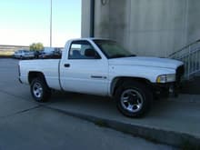 This photo was taken to show off the new (used) fender and the wheel change. Because my truck is 2 wheel drive, I ran into an issue. The 94-01 2WD front hubs will not clear the 02-08 center/hub caps. So, I put my stocks back on the front (reverse Trooper, Police, look).