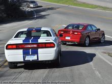 The 2011 Dodge Challenger SRT8 392 and The 2011 Dodge Charger R/T AWD