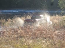 Flying through the mud and water.