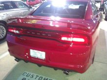 I think that SRT should have a trim specific spoiler. I like the carbon fiber one from the Redline Charger concept.