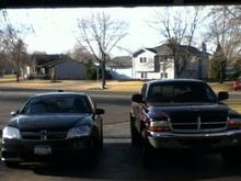 Both new Dodge's on the driveway