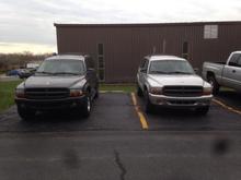 My silver durango with 3 inch torsion and 2 inch shackles on 245/70r16 next to a stock rango on 265/75r16 .. Im going to add 285/75r16's to my truck in the spring and it will be bigger then the dk gry rango :)