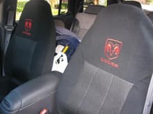 Found some nice dodge emblem bucket seat covers.  Wished they had silver color stitching.  Normally I won't use seat covers but as the front seats are used most of the time, the covers will preserve the leather plus, I don't get burned while wearing shorts either!  Wished they have the ventilated leather style that VW uses on their cars!  Ventilated leather is skin friendly in hot weather!