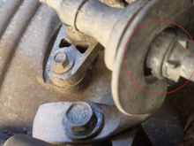 Trans cable pulled thru bracket w/o clamp