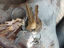 With house key to give some perspective on size. The hole that passes through into the head (at the bottom of the larger diameter hole) is about half the diameter of the larger one.