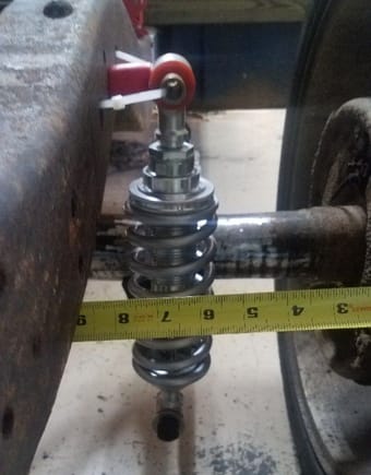 I have over 5 inches of clearance, with 7 inch wheels. This is actually one of the front shocks. 