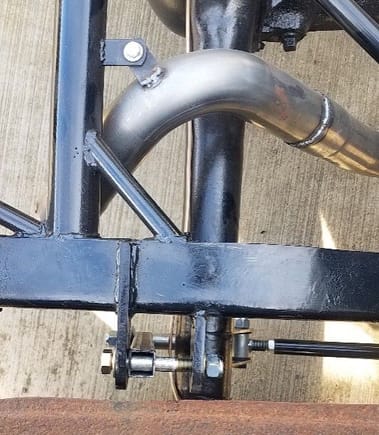 The upper shock mount needs to be almost exactly where the tab on the left needs to be. Im an idiot. I didnt account for the spacers needed to clear the axle tubes. 