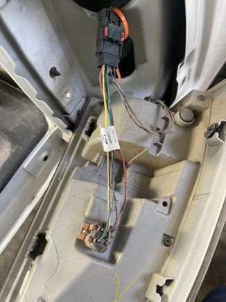 Truck harness is the plug at the rear with orange zip tie, 