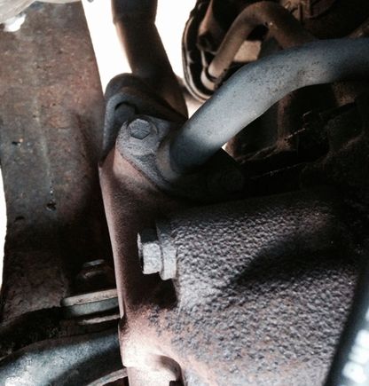 What is this roached hose coming off my header???