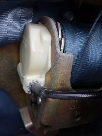 This is the housing on the side of the retractor where the cable from the switch enters.