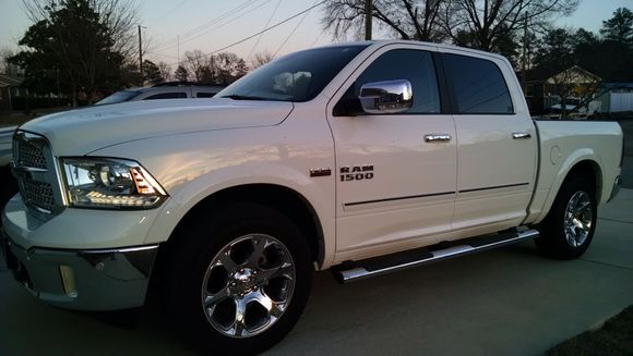 My RAM with www.sportwing.com Chromeline side molding to protect it from careless drivers. Easy install, great price.