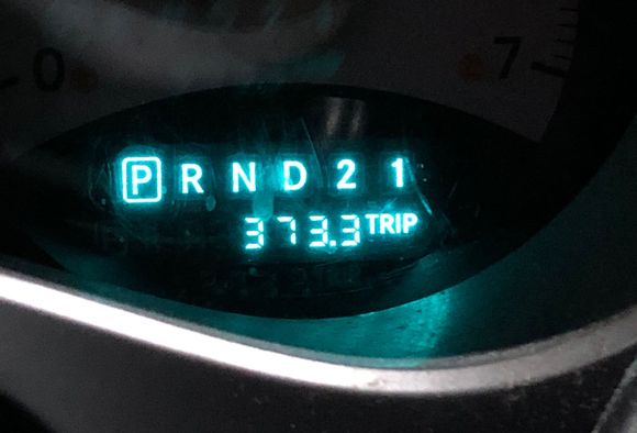 I got 373.3 miles on one tank of gas.  I did drive about 30 miles or more with the low gas light on.