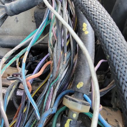 It looks like half the wire bundle has thier plastic jackets molded to gether. Besides the bare wires?