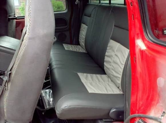 Back seats with new leather seat covers.