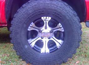 my rims (Dick Cpek wrapped wit 33" super Sawmpers
