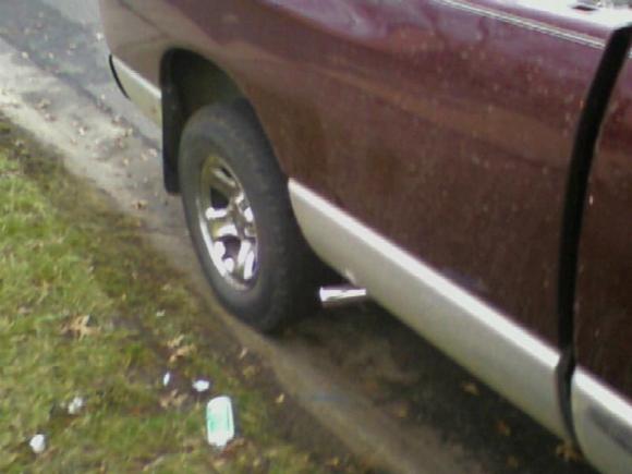 New custom Exhaust passenger side, still trying to figure out how to do the same on drivers side, gas tank seems to be in the way though.