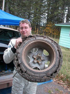 Chris Greenhouse and his shredded tire after SS2 at LSPR 2008