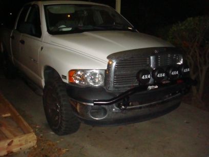 how the front end looks with the finished install of daystar light bar and 6 inch lights.