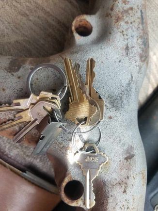 With house key to give some perspective on size. The hole that passes through into the head (at the bottom of the larger diameter hole) is about half the diameter of the larger one.