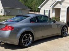 Oem style with a tad bit of business! Z1 trunk badge, Z1 emblems on rear window and 2 small side windows! rear window fiber glass lip! 06-07 g35 coupe spoiler/ color matched. (Bought without spoiler.)
 Invidia Gemini full titanium exhaust with stainless steel tips. (Super rare Discontinued Gold edition ) usually the invidia Gemini exhaust is stainless steel piping and tips are titanium! Art pipes, stillen long tube headers ported and polished for precision lining with exhaust manifold ports! 
