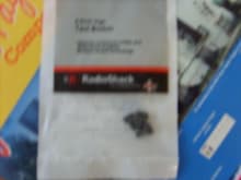 Since relocating the switch was necessary, i went to radio shack and purchased this bag of switches. They were like $3.50 for a pack of 4. (9.5mm high tact switch)