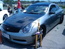 my G with my dance trophy from HIN and my Hottest Driven Infiniti trophy