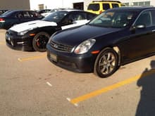 Awaiting certification at the dealership, parked next to its younger, steroid junkie brother :D