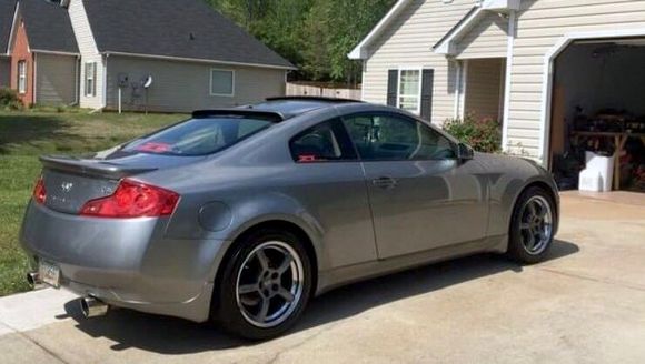 Oem style with a tad bit of business! Z1 trunk badge, Z1 emblems on rear window and 2 small side windows! rear window fiber glass lip! 06-07 g35 coupe spoiler/ color matched. (Bought without spoiler.)
 Invidia Gemini full titanium exhaust with stainless steel tips. (Super rare Discontinued Gold edition ) usually the invidia Gemini exhaust is stainless steel piping and tips are titanium! Art pipes, stillen long tube headers ported and polished for precision lining with exhaust manifold ports! 
