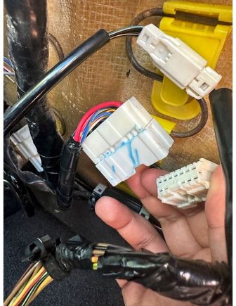 *Connector in hand is the harness from my car (05 g35 coupe 12 pin) and the 16 pin female connector is from the 06 g35 coupe.