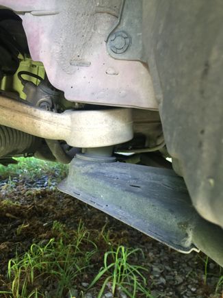 Drivers side rearward lower control arm (chassis side)