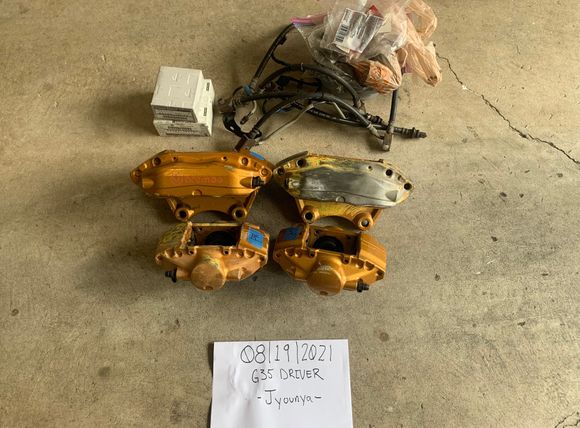 Comes with: Front and rear Calipers, 350z brake lines, OEM piston boot repair kit, and pad installation hardware.