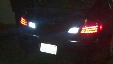 White LED reverse lights with red stripe removed.