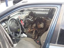 Engine in passenger seat.