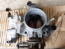 Failing to get the mouse out of the throttle body, I removed it.