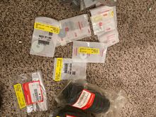 Some OEM thingss. I replaced the steering rack with an OEM (manual) one after 2-3 bad parts store racks. So you can see some new boots here for that, and misc other goodies. 
