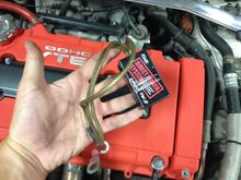 I took this thing off it was two sided taped to the fire wall and one cable went to the positive on the battery and the other to the negative no idea the purpose of this. i wanted to keep cleaning up my engine bay so it had to go