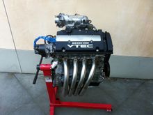 Complete valve cover gasket set, new NGK plugs and wire. Highend header looking so fresh and so clean.