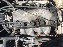 Hey guys.  I have an 89 hatchback civic.  When I bought it it had a vtec engine in it.  Obviously someone engine swapped it cuz they didn't make vtec in 89.   You can see the green plug up on the  upper left hand corner (sorry it's not a good pic I'll put another tomorrow) the plug is not attached to anything.  I want to know how or if I even can hook that up   Any help will be greatly appreciated