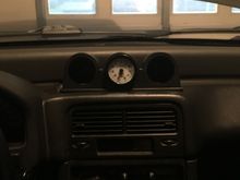 Started remounting my gauges.  Didn't get too far since the wiring was a mess.  Unfortunately I'll have to extend two of the harnesses to reach up to here.