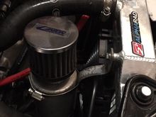 Bent catch can bracket