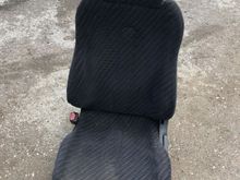 Driver seat w/o a rip. Very hard to find in this cond