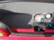 Trunk has tool kit still, excellent shape, car still has OEM SPARE TIRE up front and jack as well.   Convertible leather cover also still with car.
