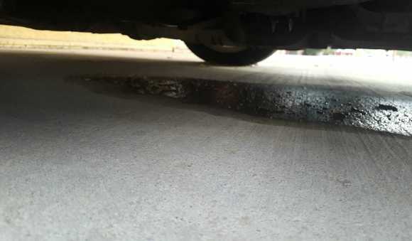 Puddles under the car!