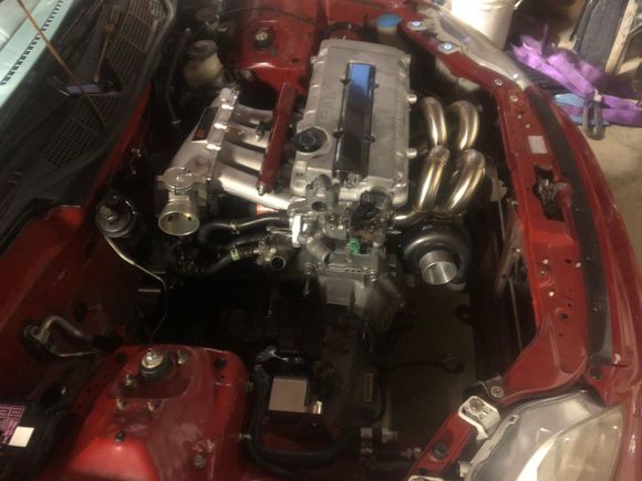 Manifolds on just to see potential clearance issues, tiny little turbo lol