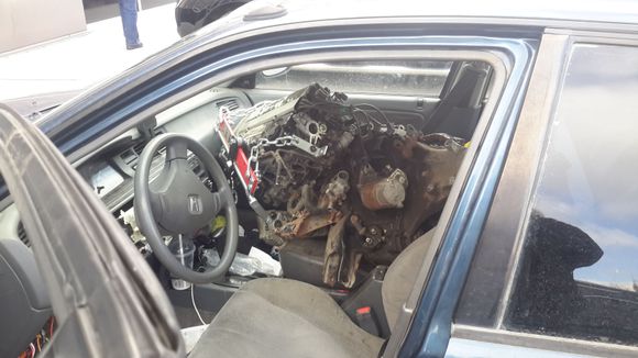 Engine in passenger seat.