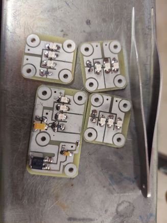 Here you can see I designed some small circuit boards for the ambient foot well lighting.  I design and build all of my own custom circuitry by hand.  The main board (the biggest one) feeds power to the other ones, and it gets its supply from the parking light output.  