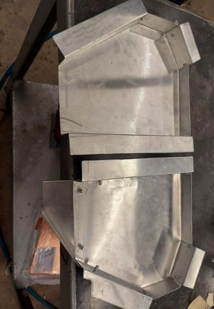 2 trays done.  The driver side has an extension chute which helps push the water away from the dipstick area and further towards the passenger side.