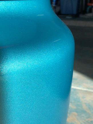 Paint in the sun. Really brings out the metallic.