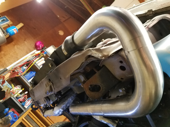 Tacking together hot-side charge pipe.