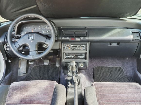 always had seatcovers on the front seats, for protection, but removed for the photos